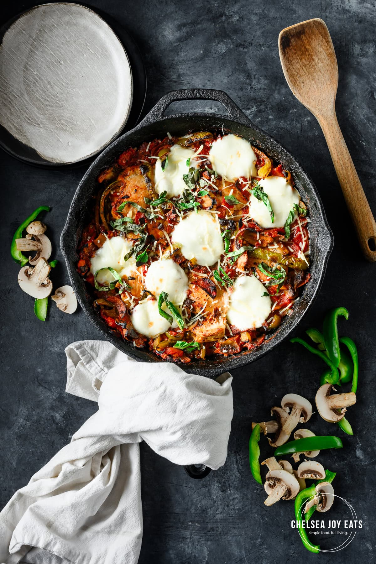 Overhead view of gluten free skillet pizza chicken casserole sered in a cast iron skillet