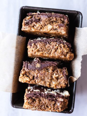 Overhead view of tray with no bake peanut butter bars on their side