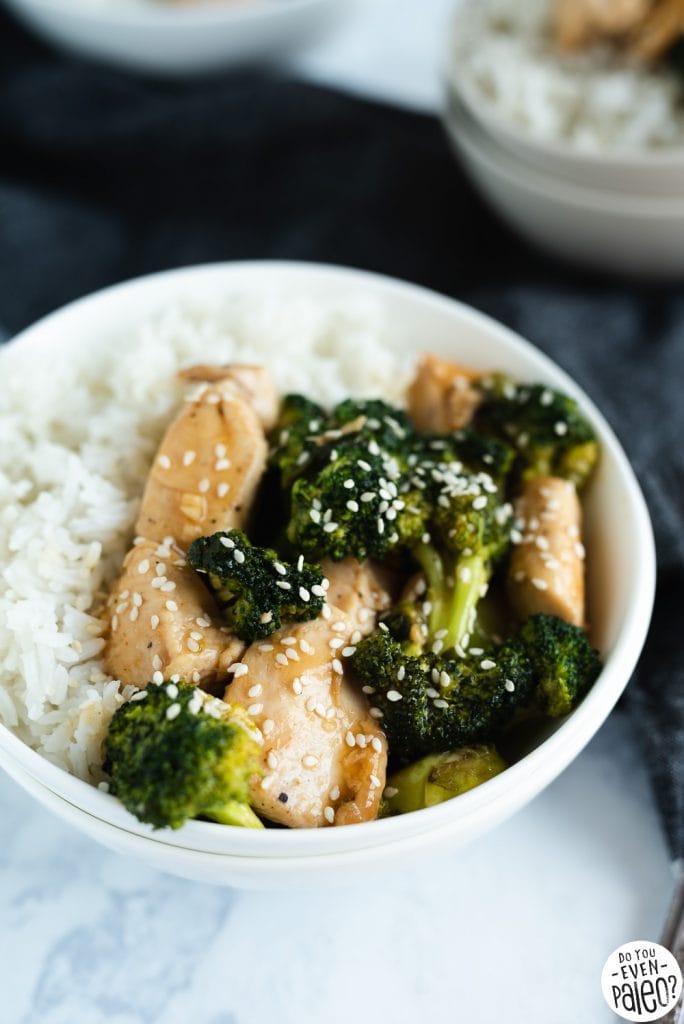 Quick & Easy Chicken & Broccoli Stir Fry Recipe ingredients with a dark napkin on a marble background by DoYouEvenPaleo.net