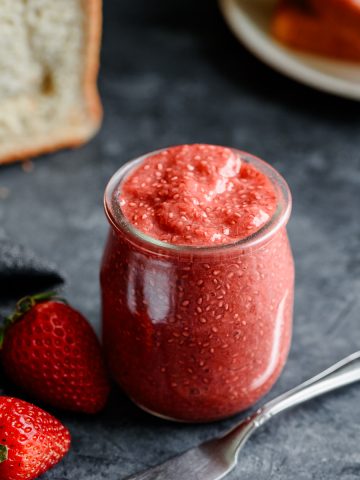 Small jar of strawberry chia seed jam with rhubarb