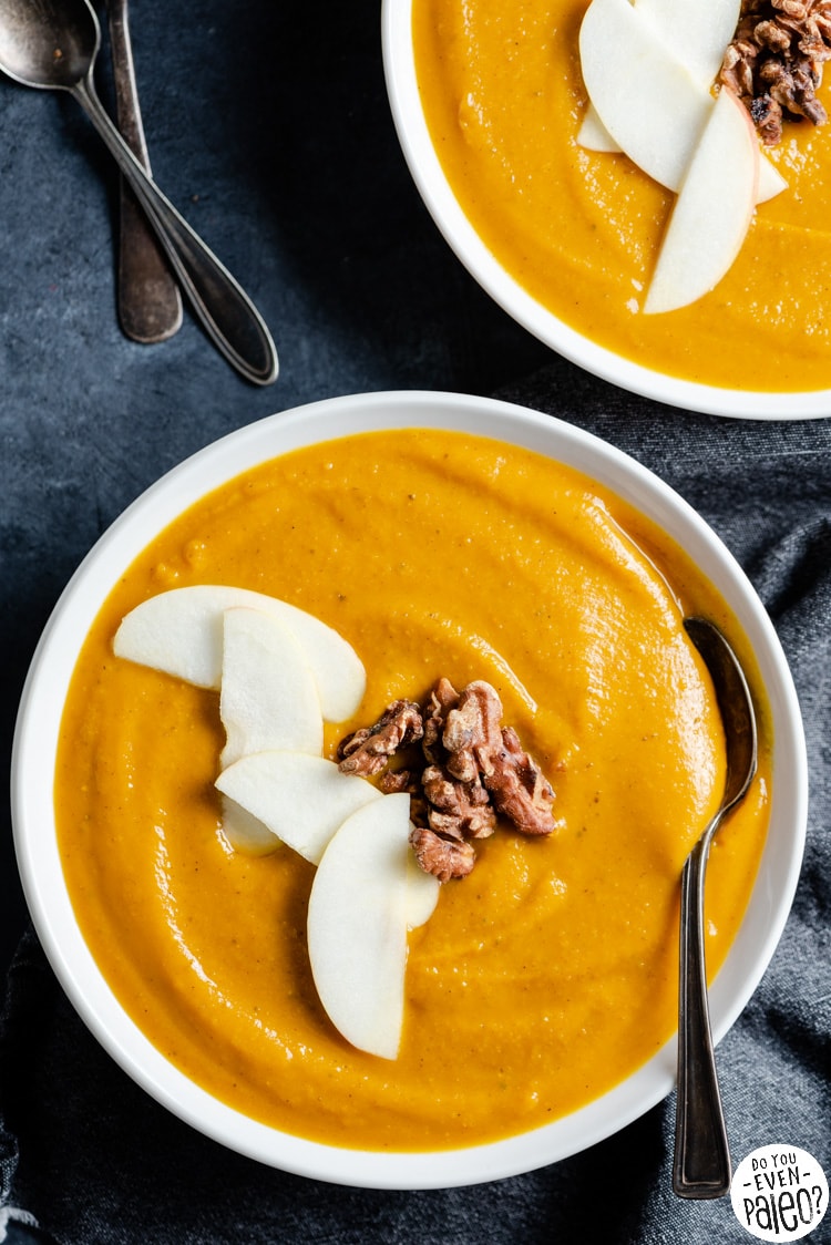 Closeup of a bowl of roasted squash and apple soup