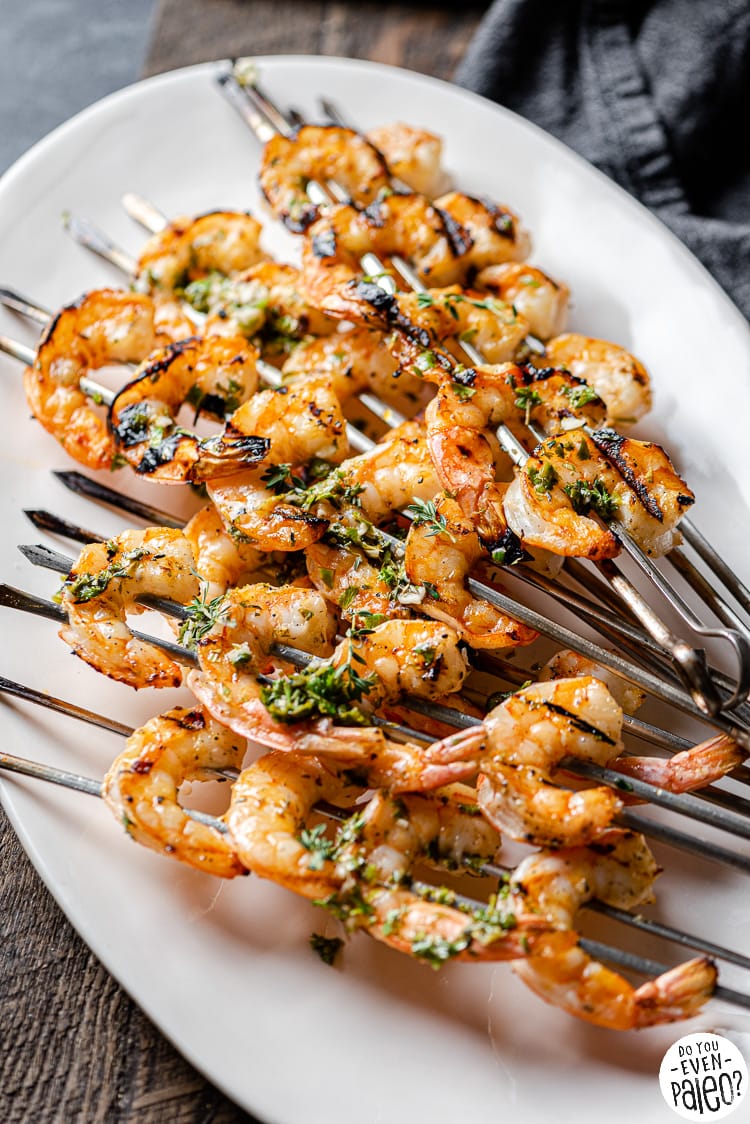 Platter of herbed grilled shrimp skewers