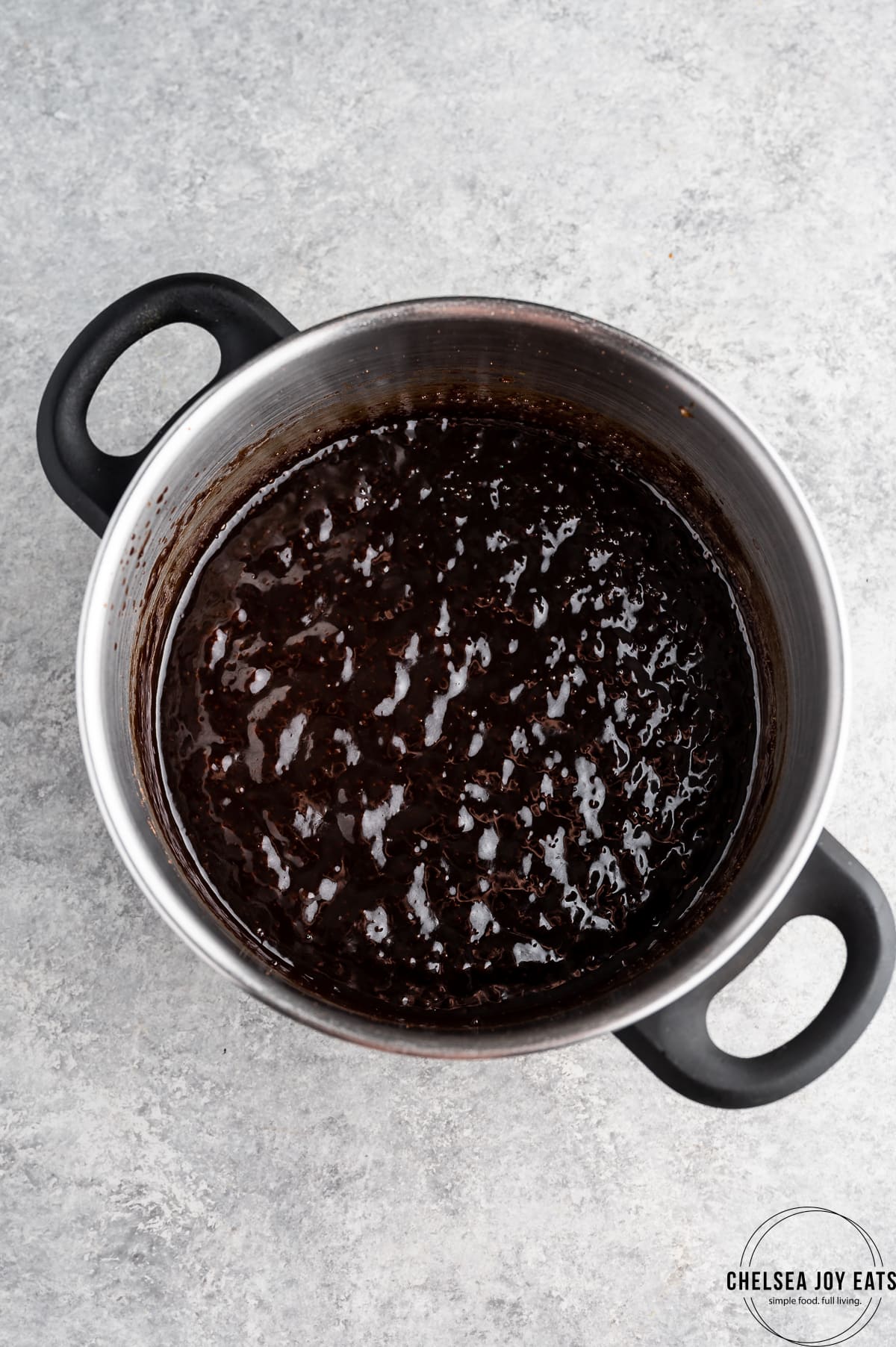 Chocolate syrup boiling in a pot
