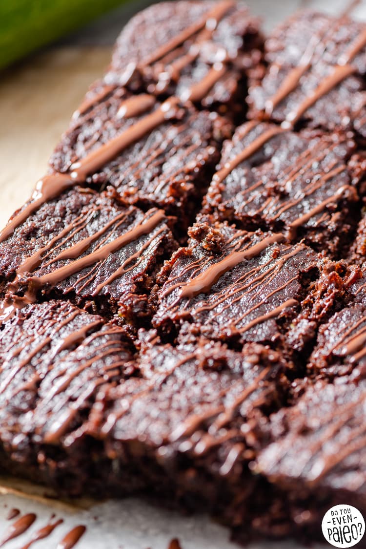 Zucchini brownies drizzled in chocolate