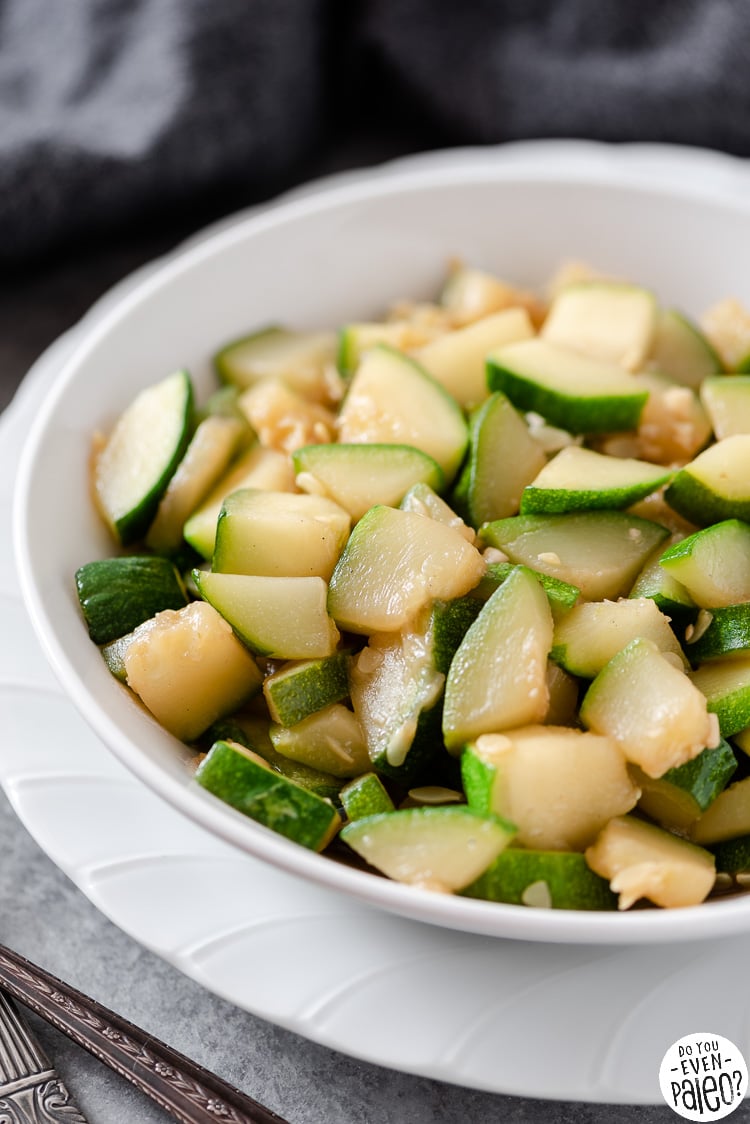 Closeup of a bowl of sauteed zucchini (keto, paleo)
