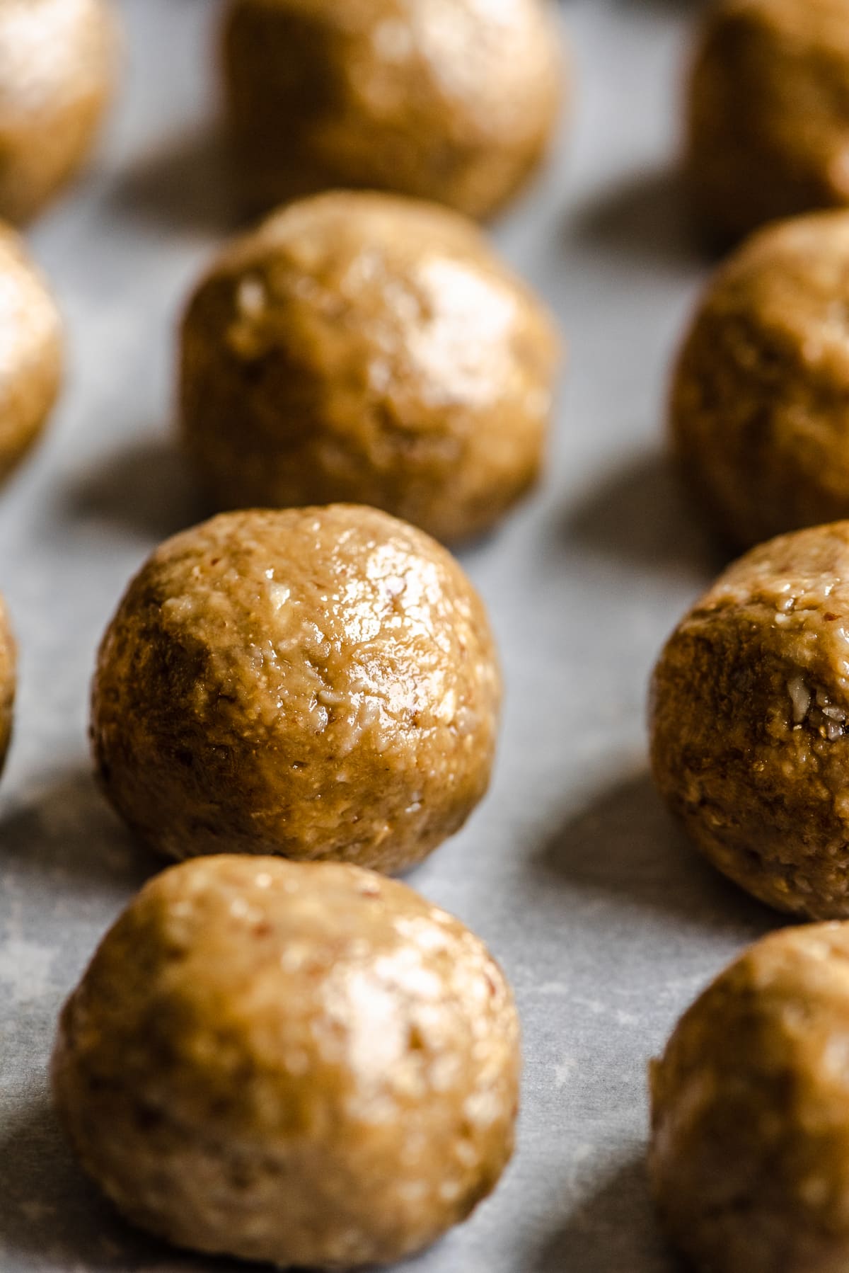 closeup of nut free Sunbutter Energy Balls on parchment paper