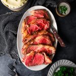 Platter with slices of smoked prime rib