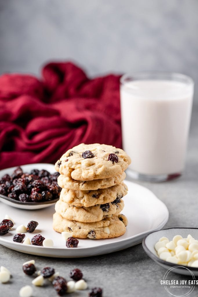 Plate stacked with gluten free white chocolate cranberry cookies