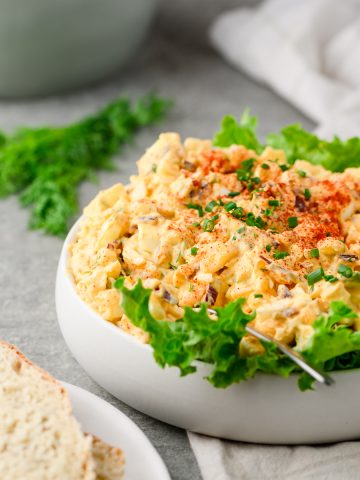 Cottage cheese egg salad served in a bowl over lettuce