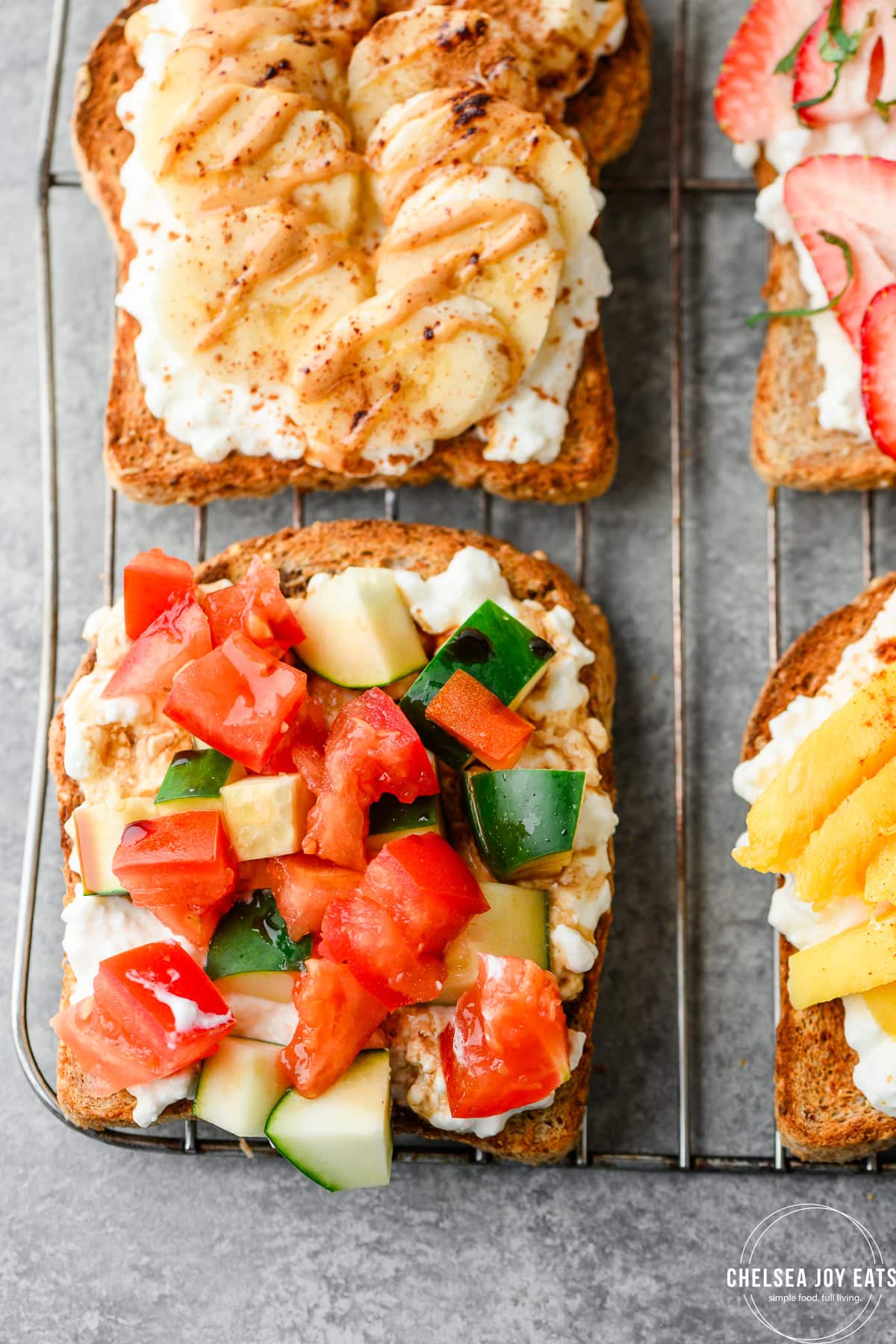 Toast topped with cottage cheese, cubed tomato, cubed cucumber, and balsamic drizzle