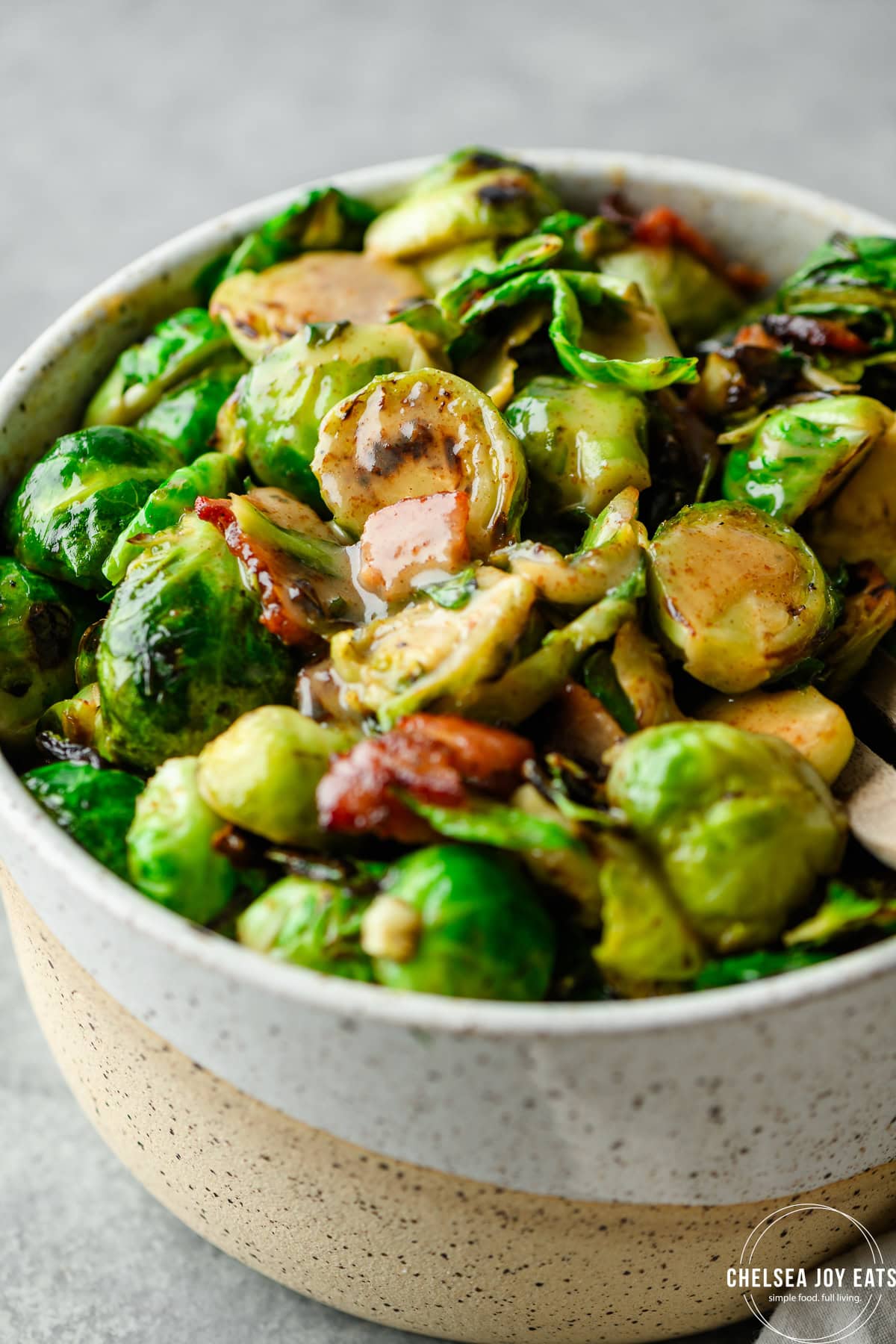 Closeup of Brussels sprouts with bacon honey mustard sauce
