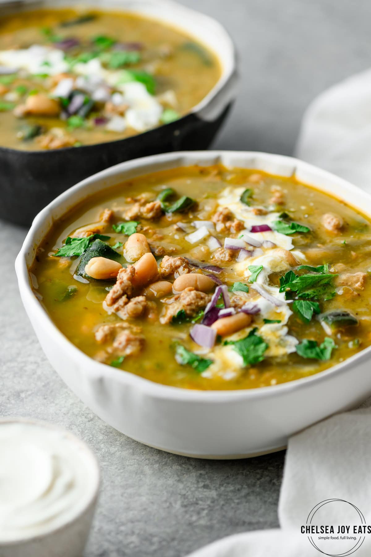 Closeup of a bowl of turkey and poblano chili