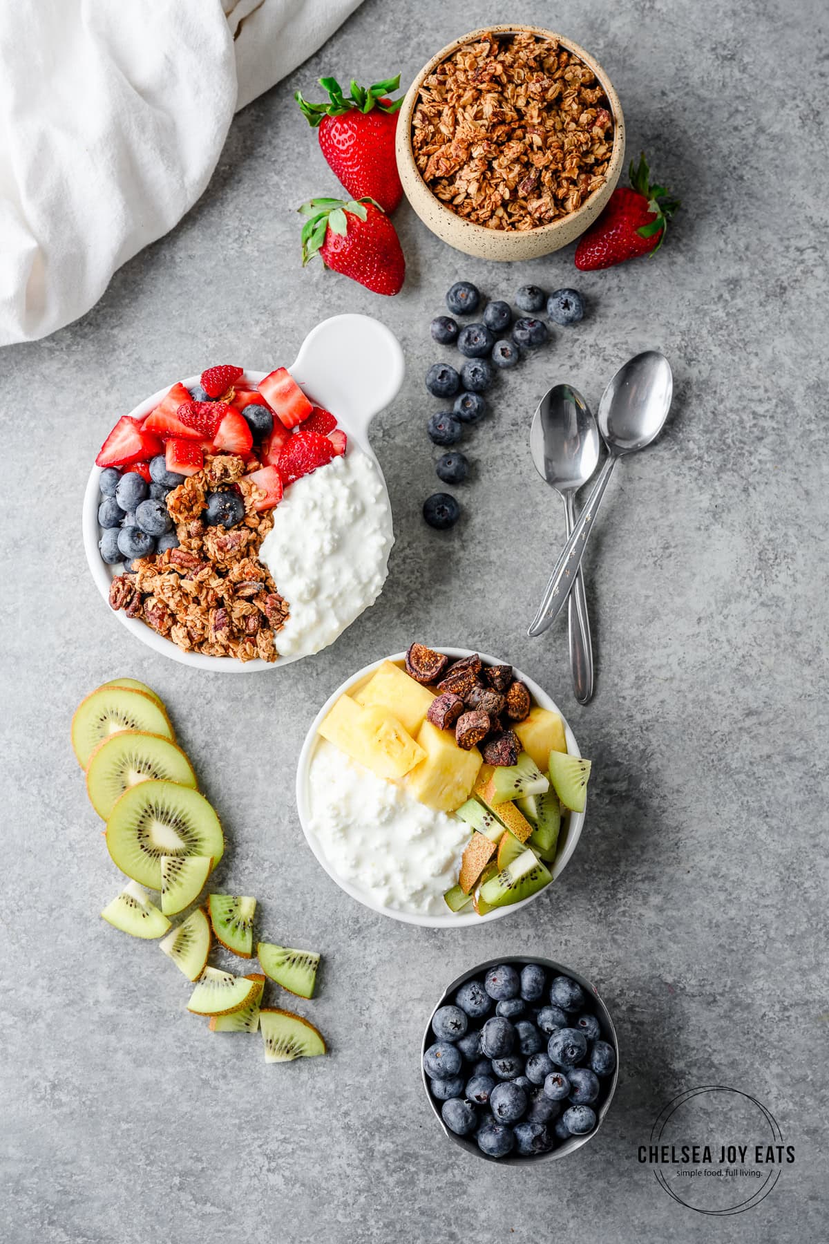 Bowls of cottage cheese with fruit and other toppings