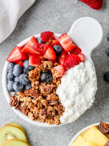 Bowl with cottage cheese, fresh fruit, and granola