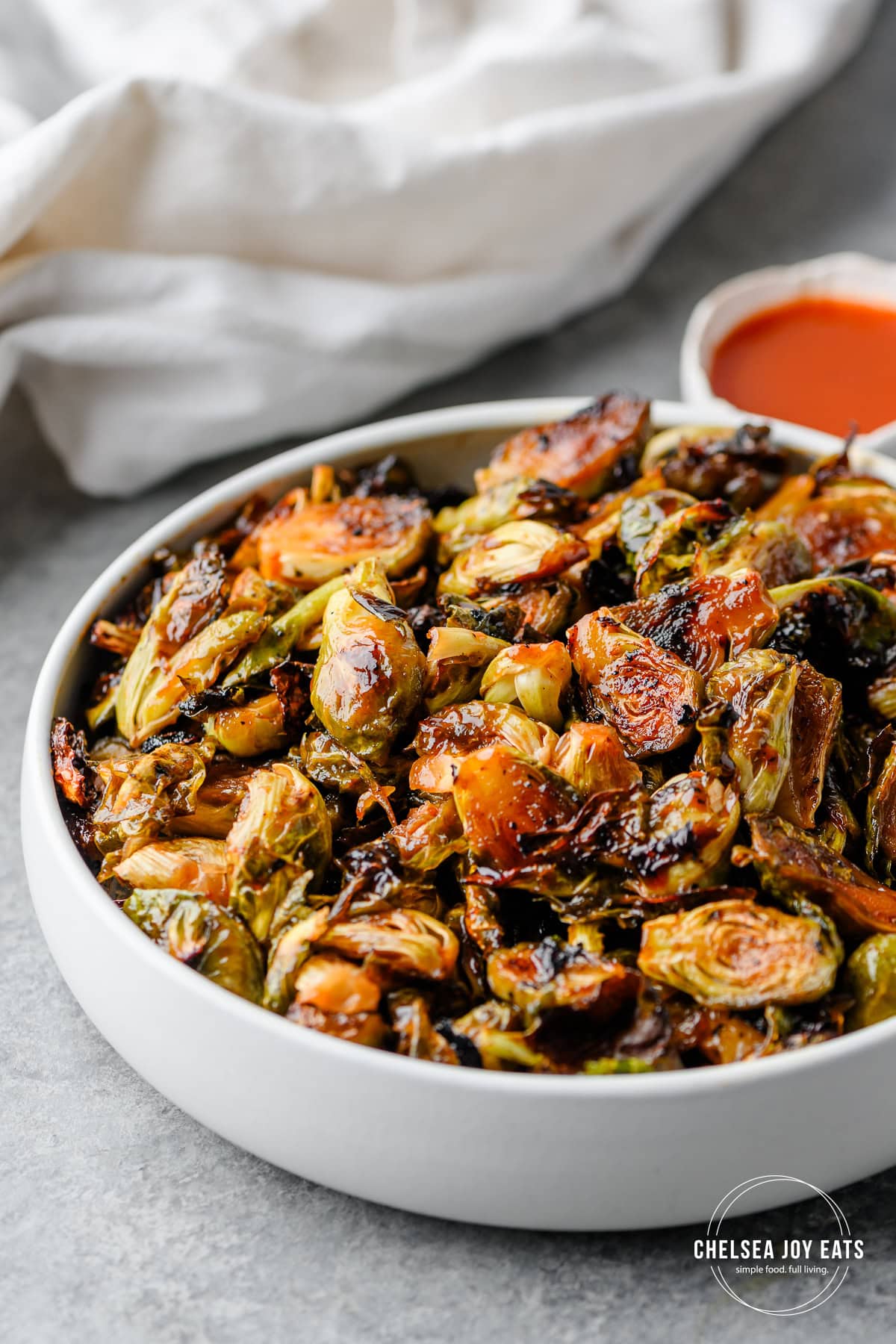 Serving bowl with glazed hot honey brussels sprouts