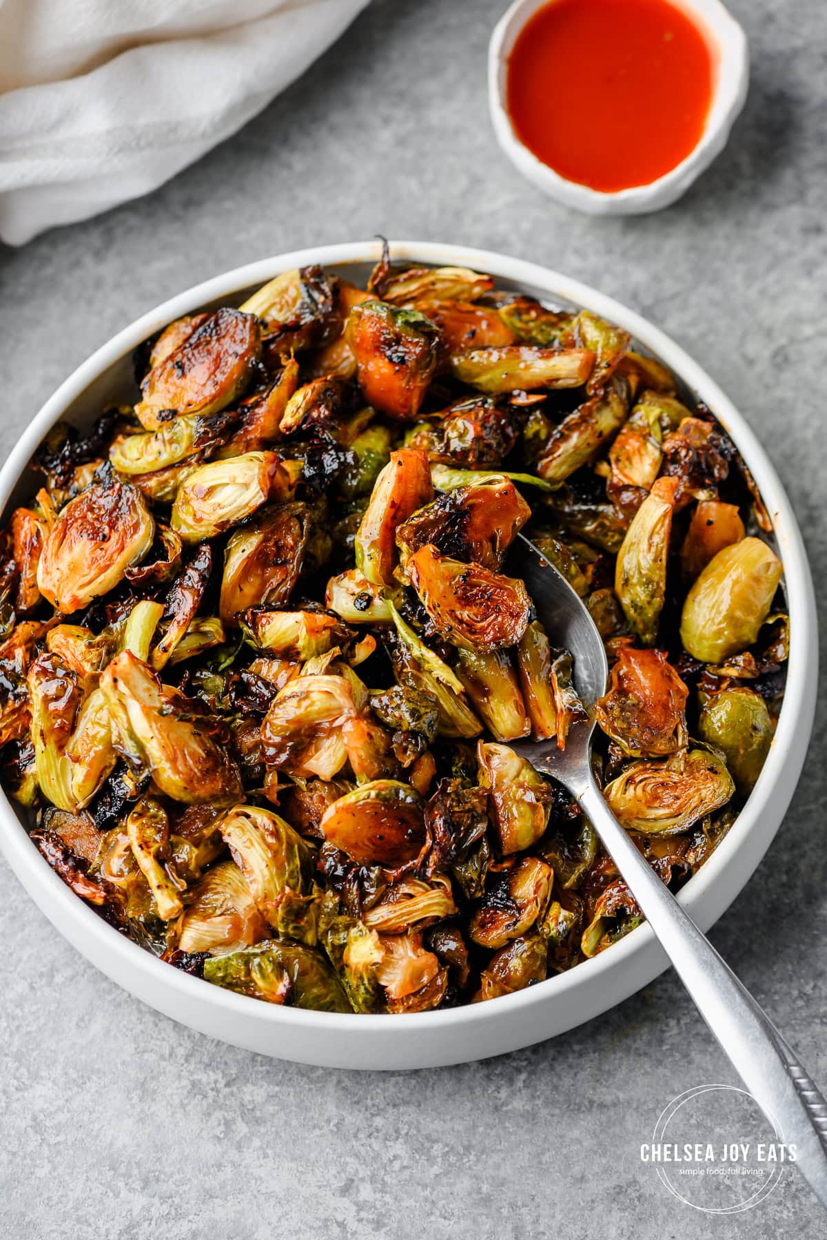Serving bowl with glazed hot honey brussels sprouts