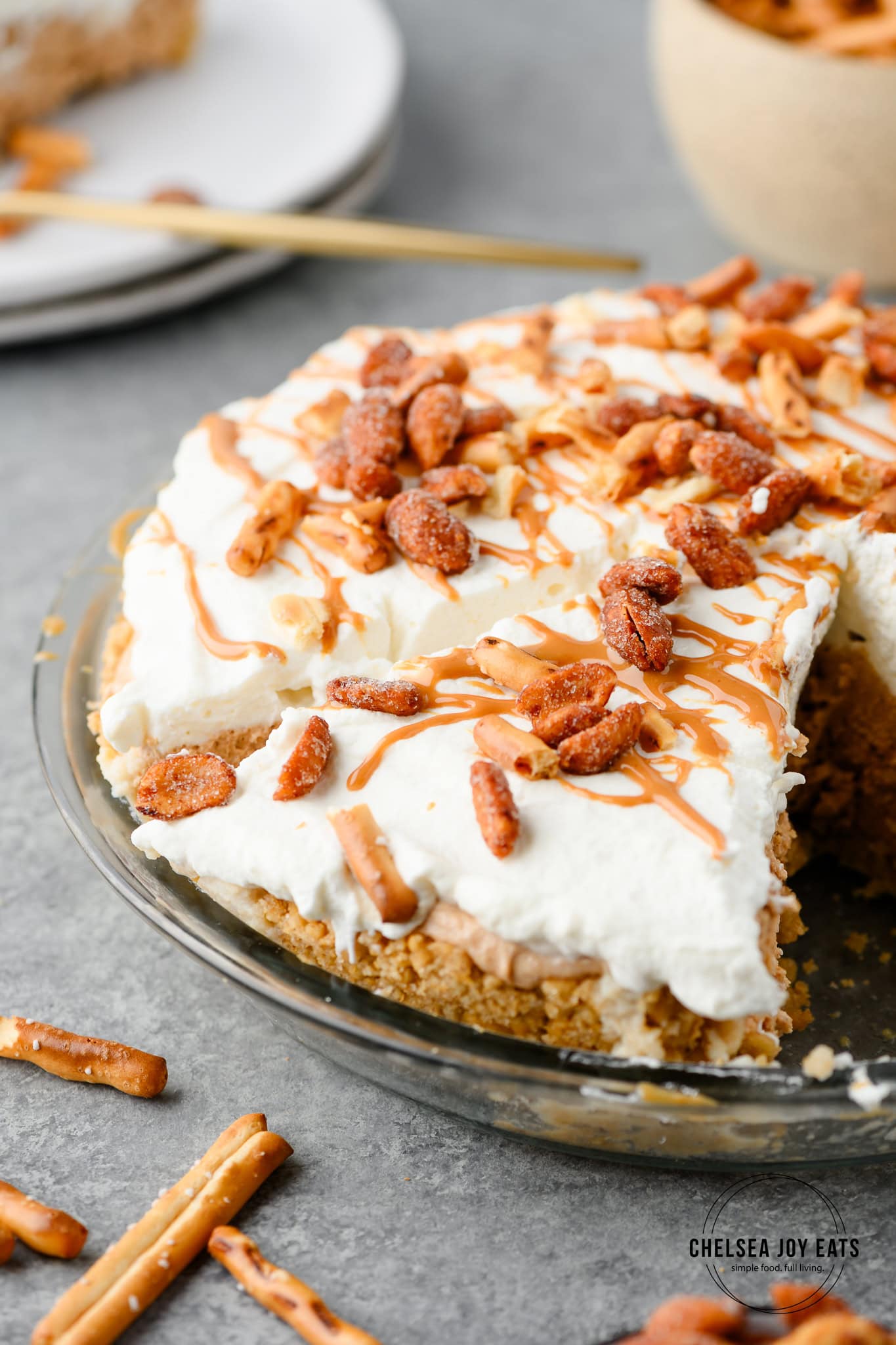 Peanut butter pretzel pie sliced in the pie dish