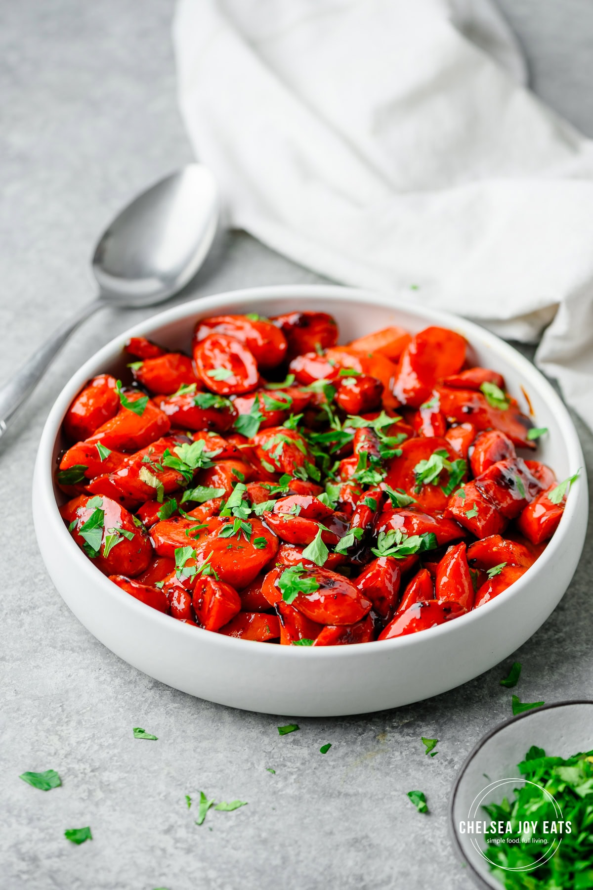 Serving bowl of carrots glazed with hot honey sauce