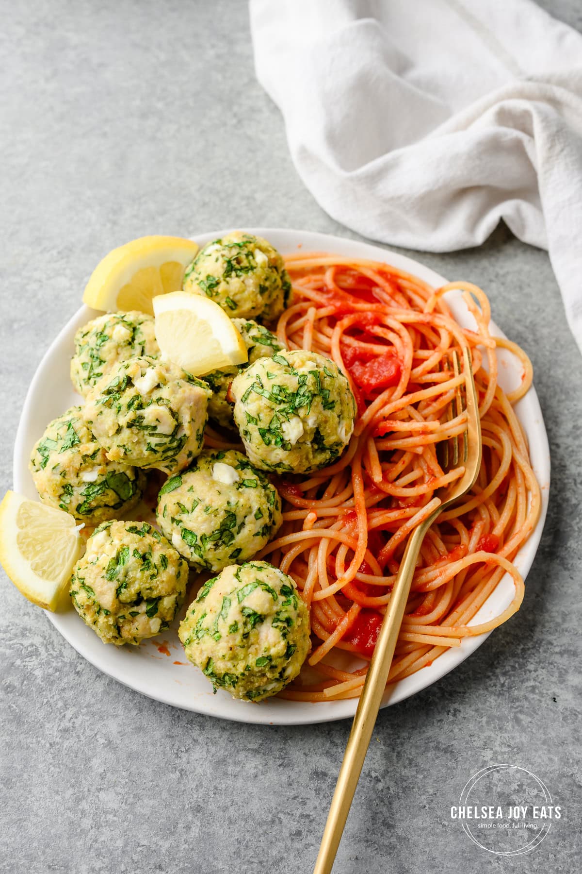Spinach and feta chicken meatballs served with spaghetti