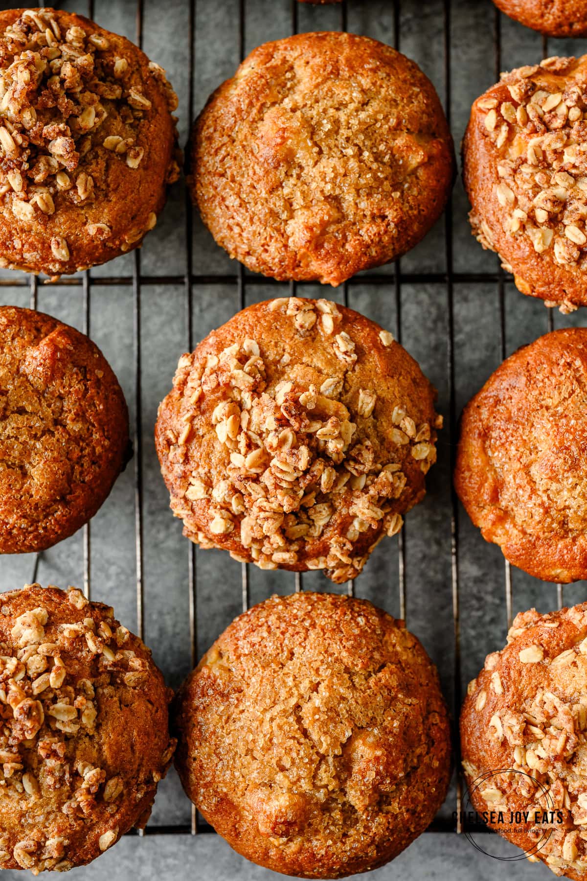 Overhead closeup of the tops of gluten free apple muffins, some with a streusel topping