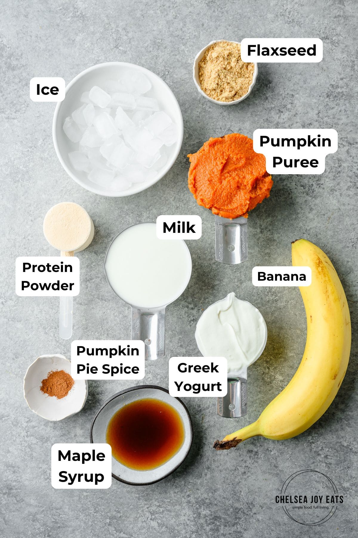 Ingredients for pumpkin protein smoothie with text labels for each ingredient