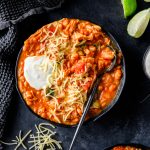 Gluten Free Turkey and Pumpkin Chili garnished with sour cream and cheese