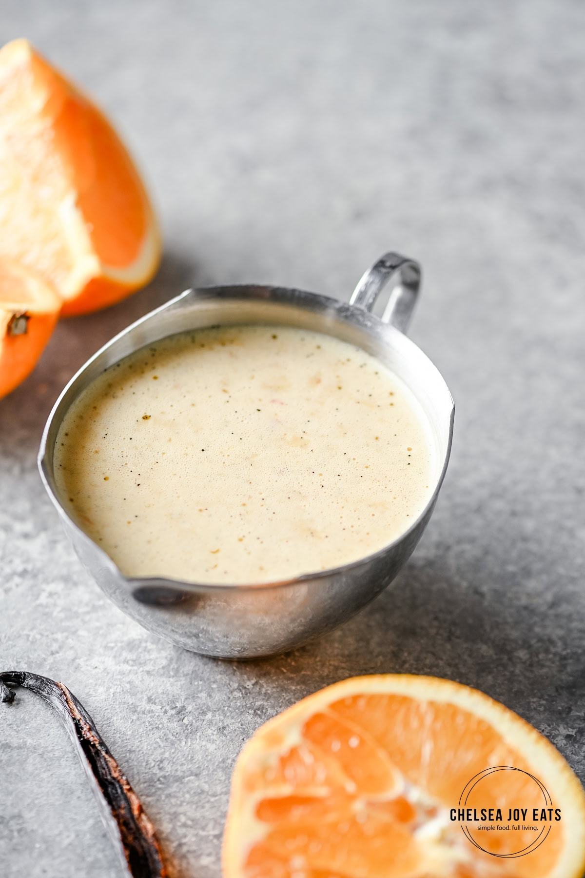 Closeup of orange vanilla vinaigrette in a serving dish