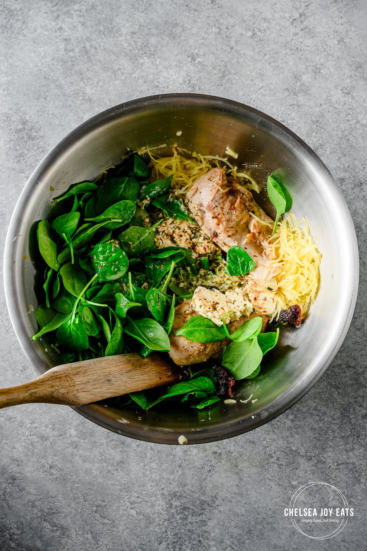 Combine all ingredients in a large mixing bowl, stirring until feta cheese melts.