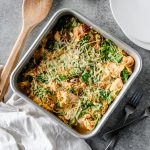 Overhead view of a high protein spaghetti squash casserole with feta, spinach, and chicken