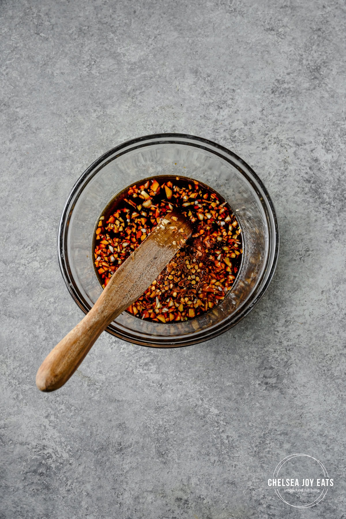 Tamari, honey, garlic, and chili powder in a bowl