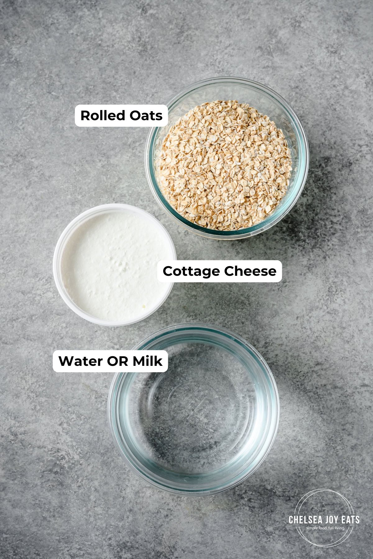 Ingredients needed for high protein cottage cheese overnight oats in individual containers with text labels, including rolled oats, cottage cheese, and water.