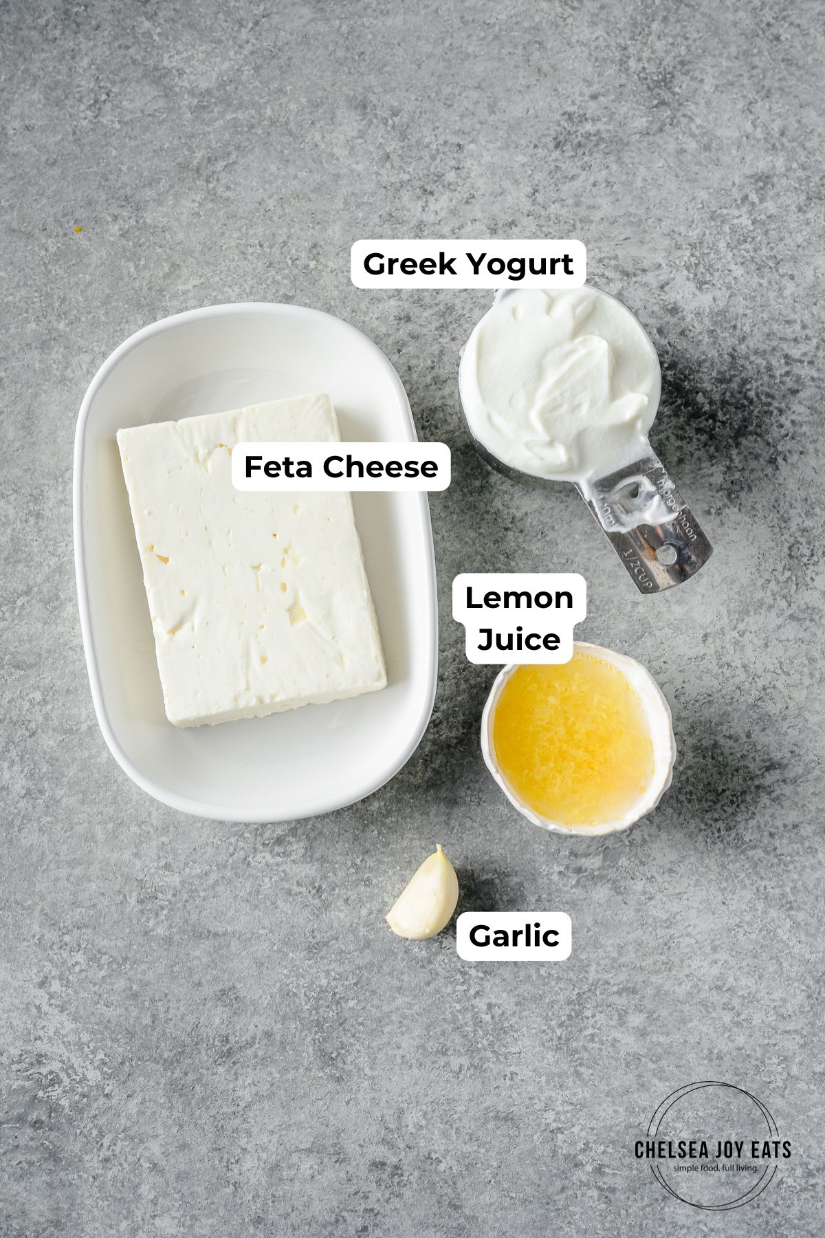 Ingredients for simple whipped feta sauce with text labels for each ingredient.
