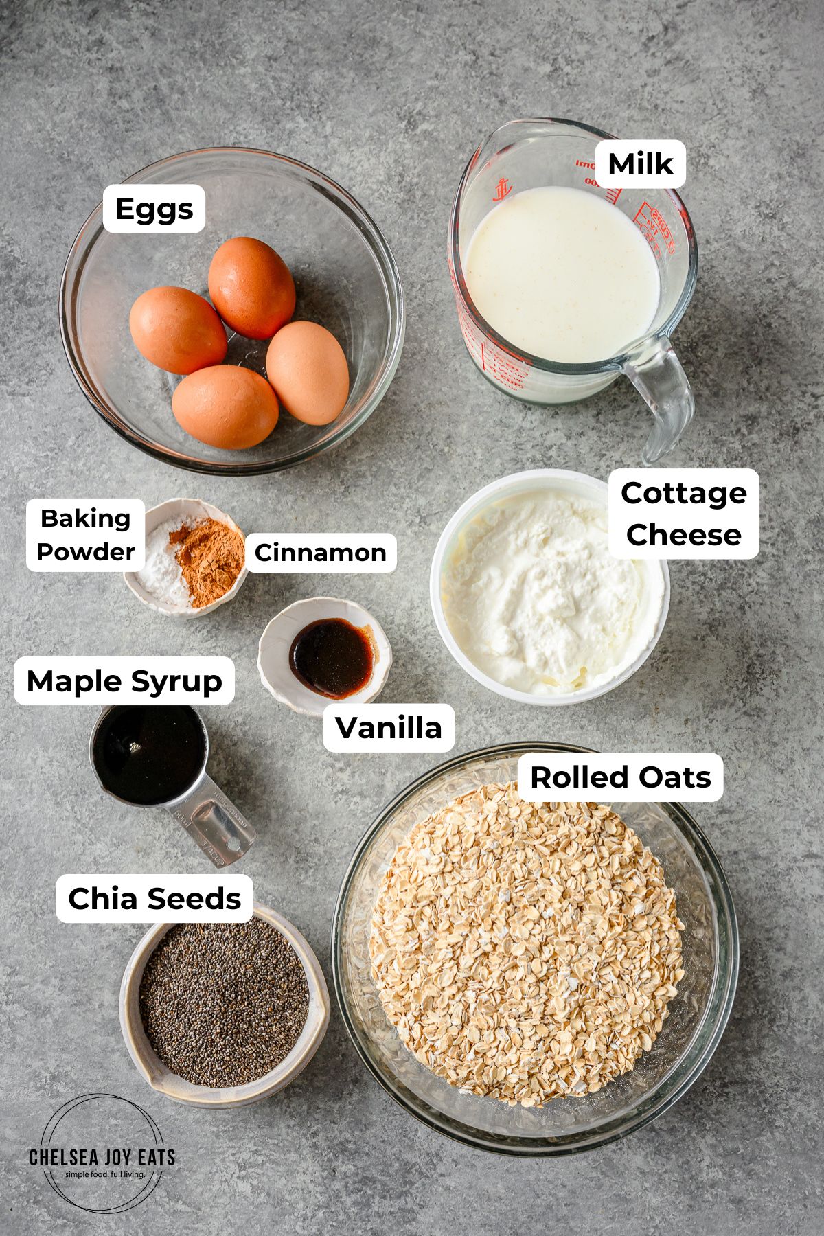 Ingredients for cottage cheese baked oats in individual bowls, with text labels for each ingredient.