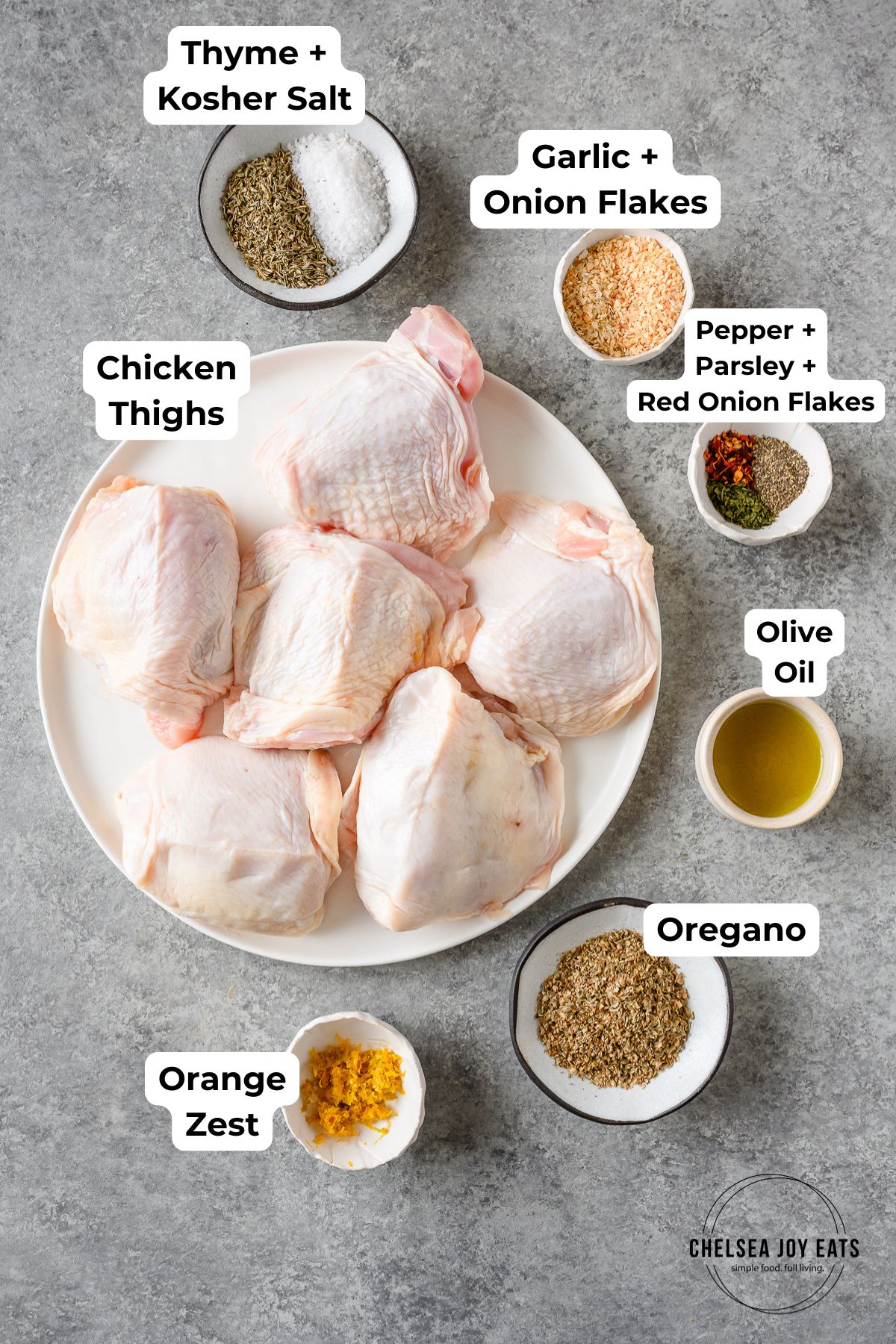 Ingredients for grilled Greek Chicken Thighs, with text labels for each ingredient.