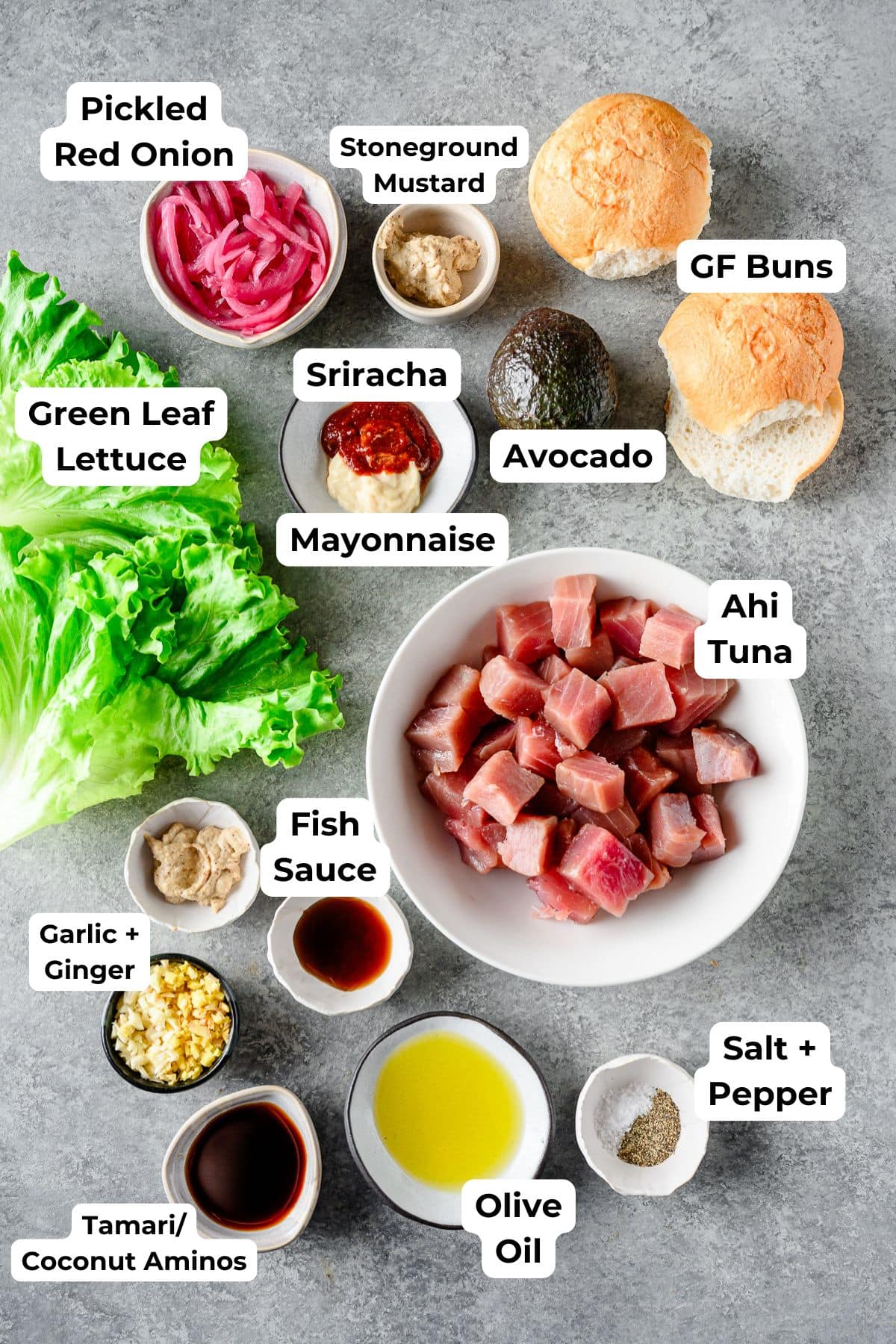 Ingredients for gluten free tuna burgers in individual dishes, with text labels for each ingredient.