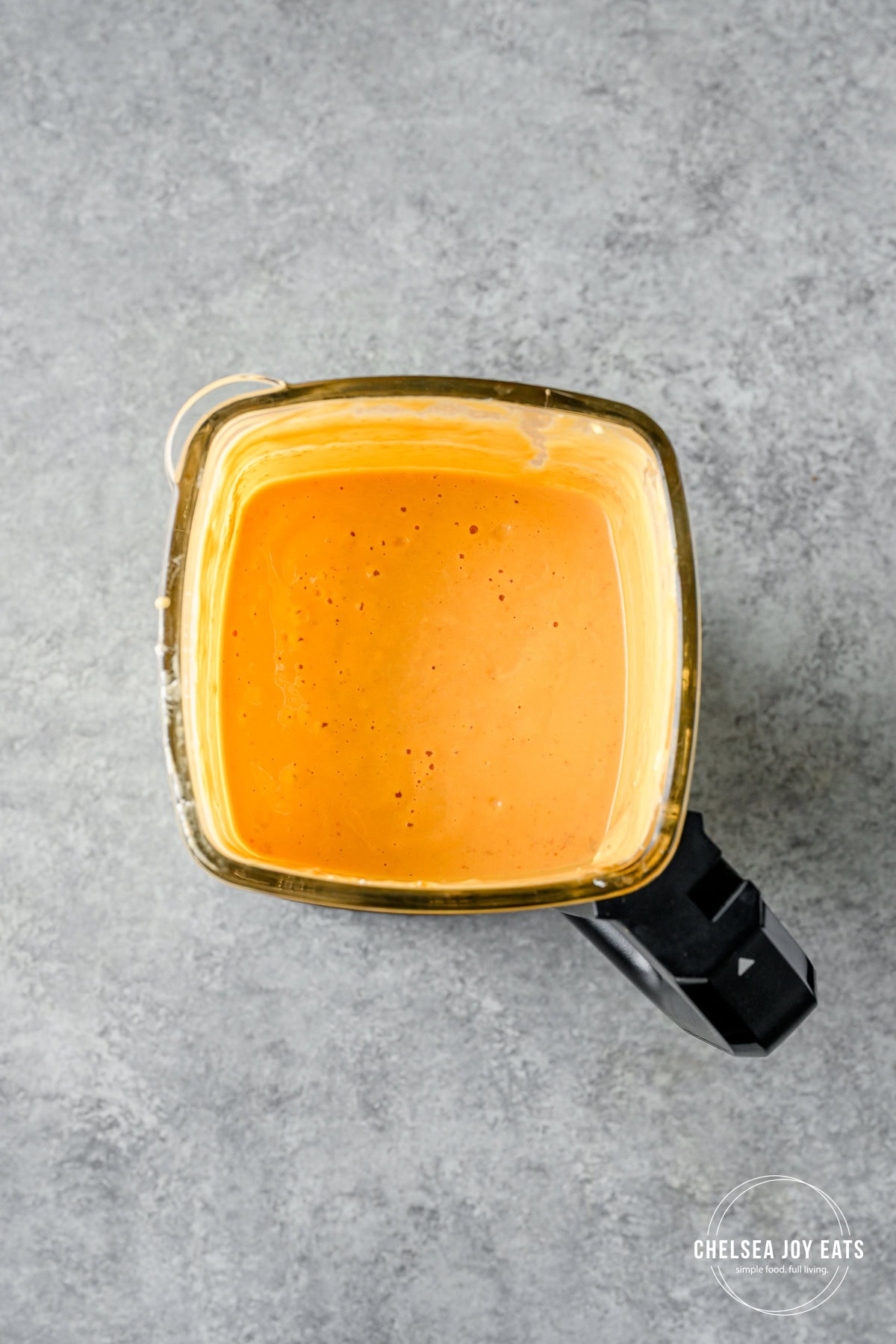Blended pumpkin mixture in the jar of a blender.