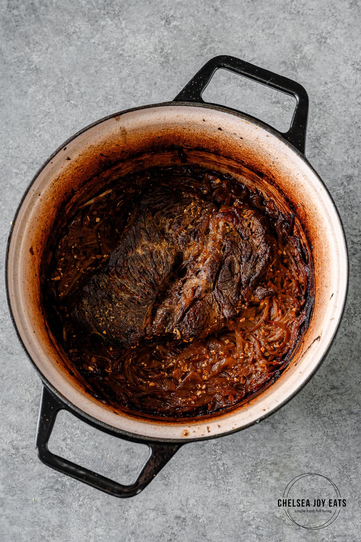 Braised chuck roast in a miso ginger sauce in a Dutch oven.
